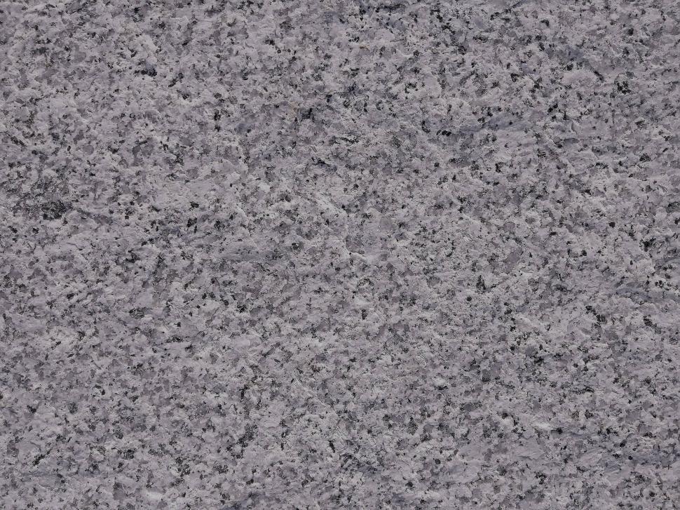 Free Image of Speckled rock texture background  