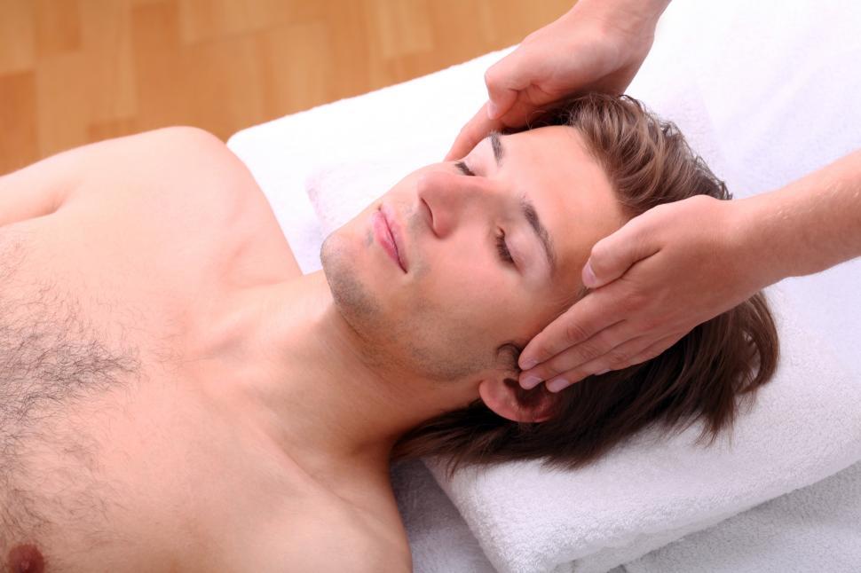 Free Image of Handsome man enjoying face massage 