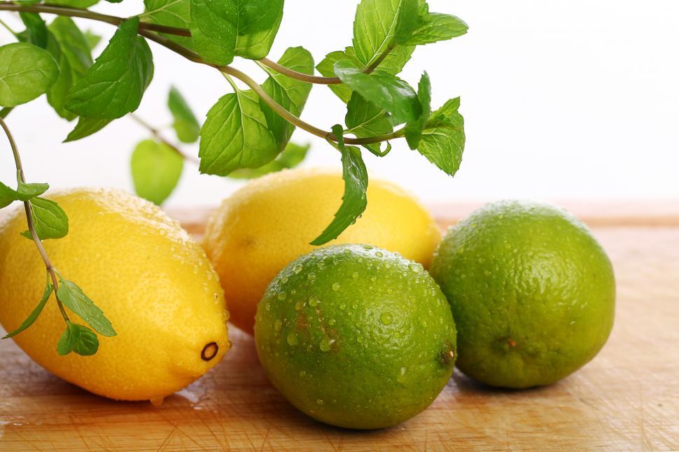 Free Image of Lemons and limes - citrus on the table 