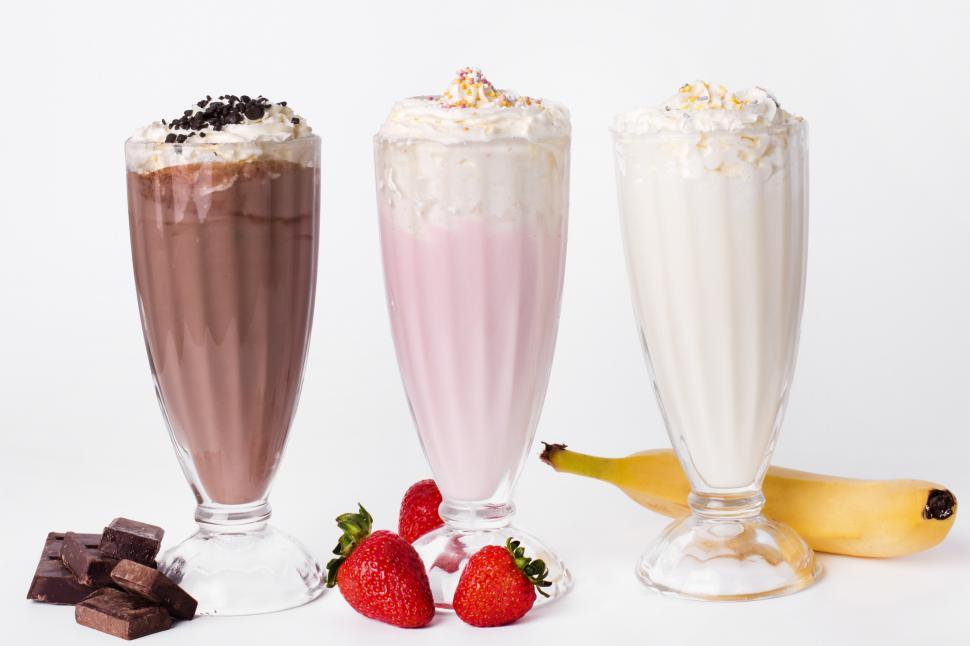 Free Image of Milkshake on the table - Chocolate, Strawberry and Vanilla 