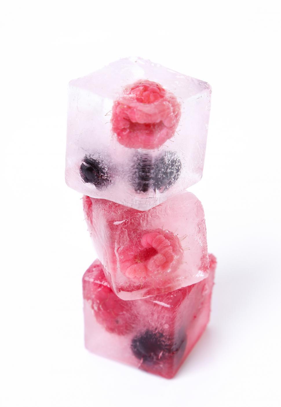 Free Image of Frozen berries in a stack of ice cubes 