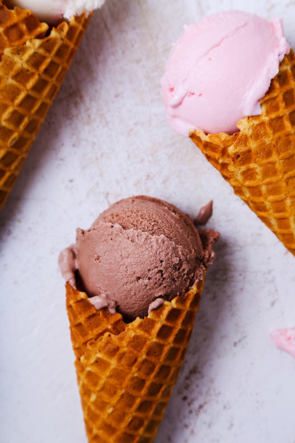 Free Image of Delicious chocolate and strawberry ice cream cones 