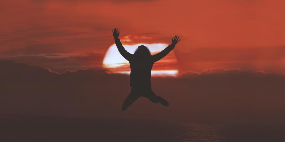 Free Image of Jumping in the air against sunset 