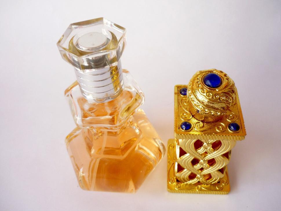 Free Image of Two Bottles of Perfume Side by Side 