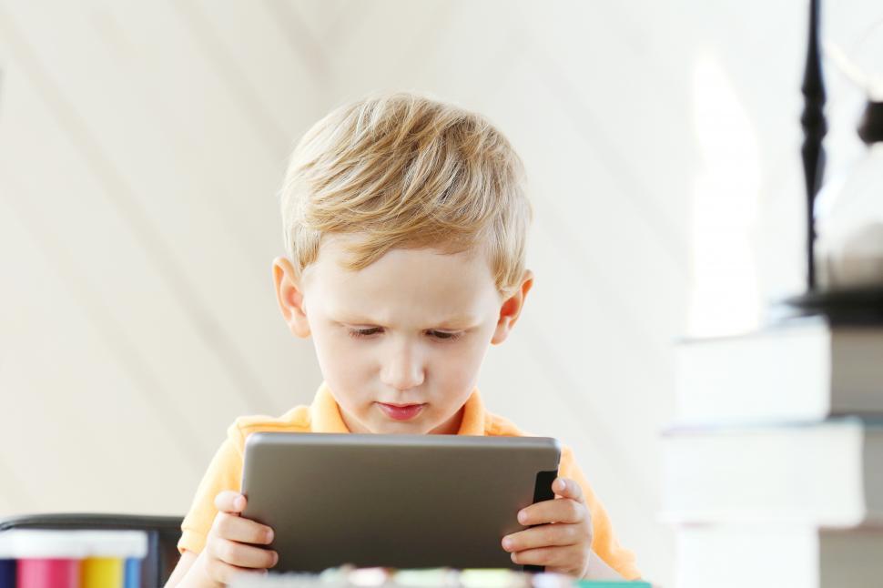 Free Image of LIttle kid with a tablet device 