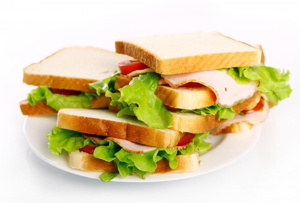 Free Image of Three tasty sandwiches on the plate 