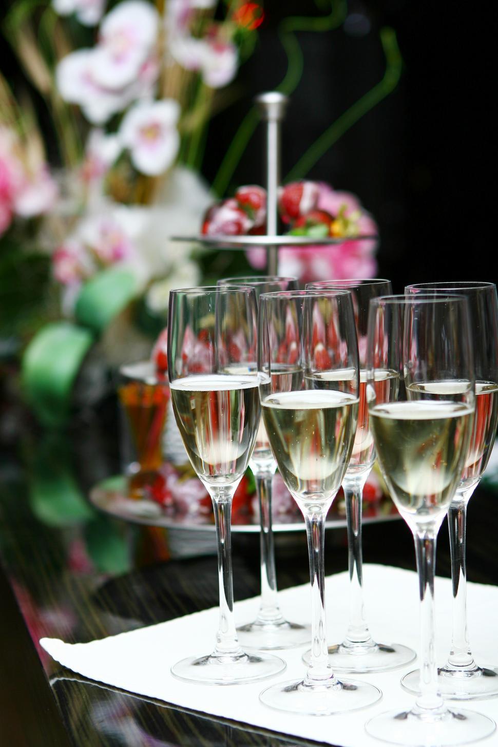 Free Image of Filled champagne glasses on the table ready for serving  
