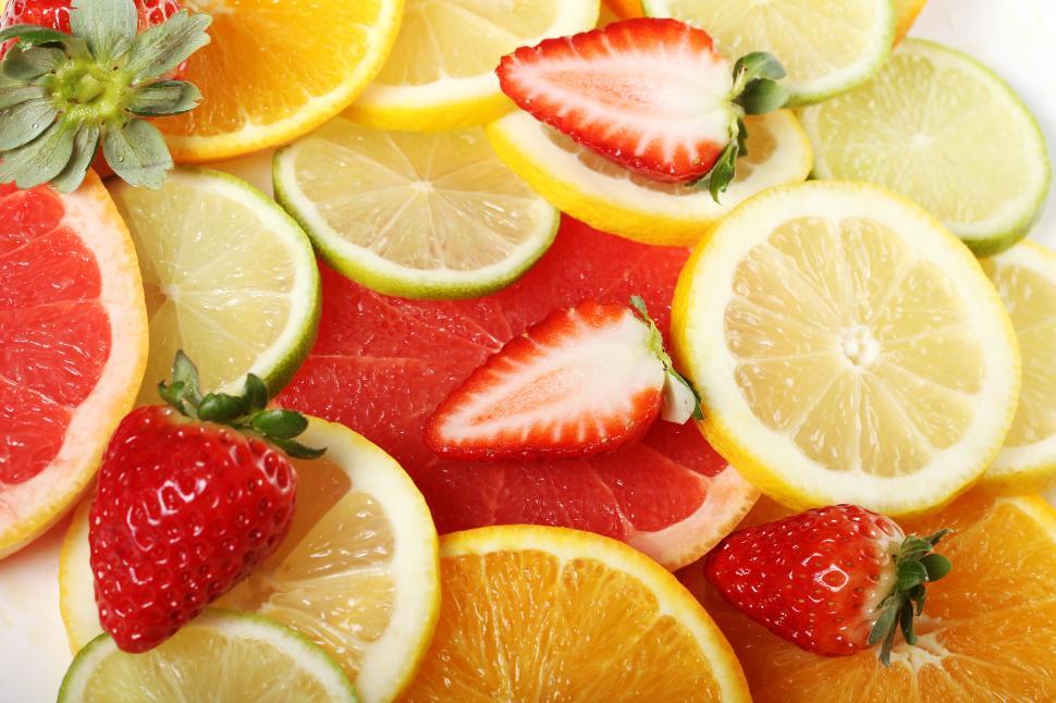 Free Image of Close up of fresh fruits, citrus and strawberries 