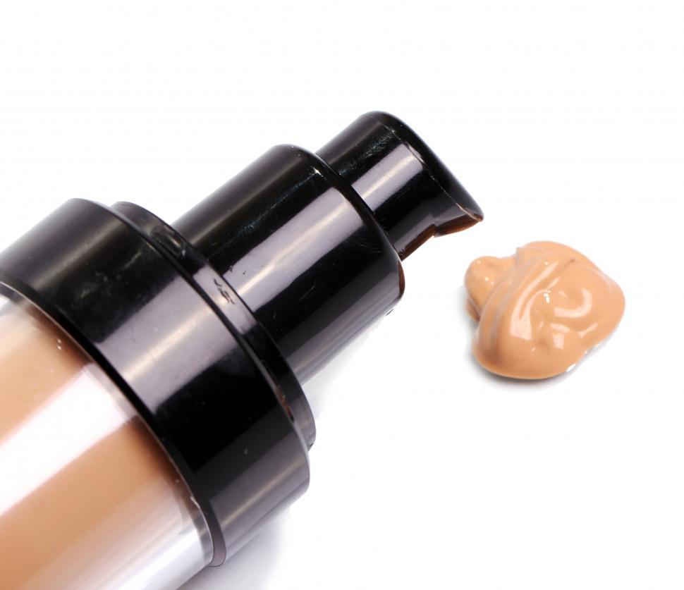 Free Image of Foundation cream dispensing from a bottle 