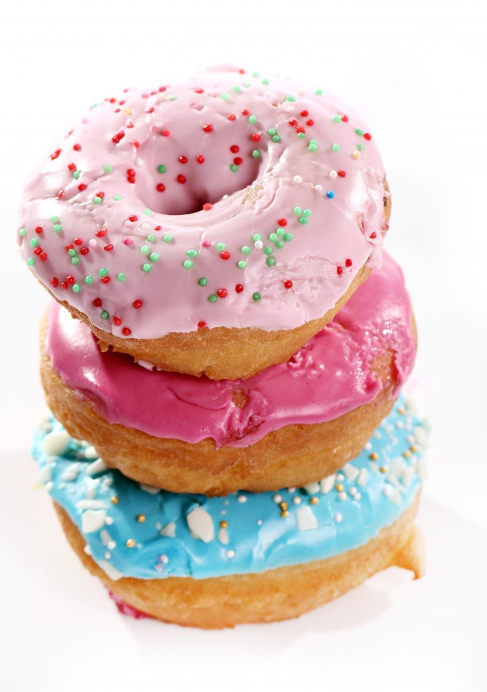 Free Image of Three tasty donuts stacked 