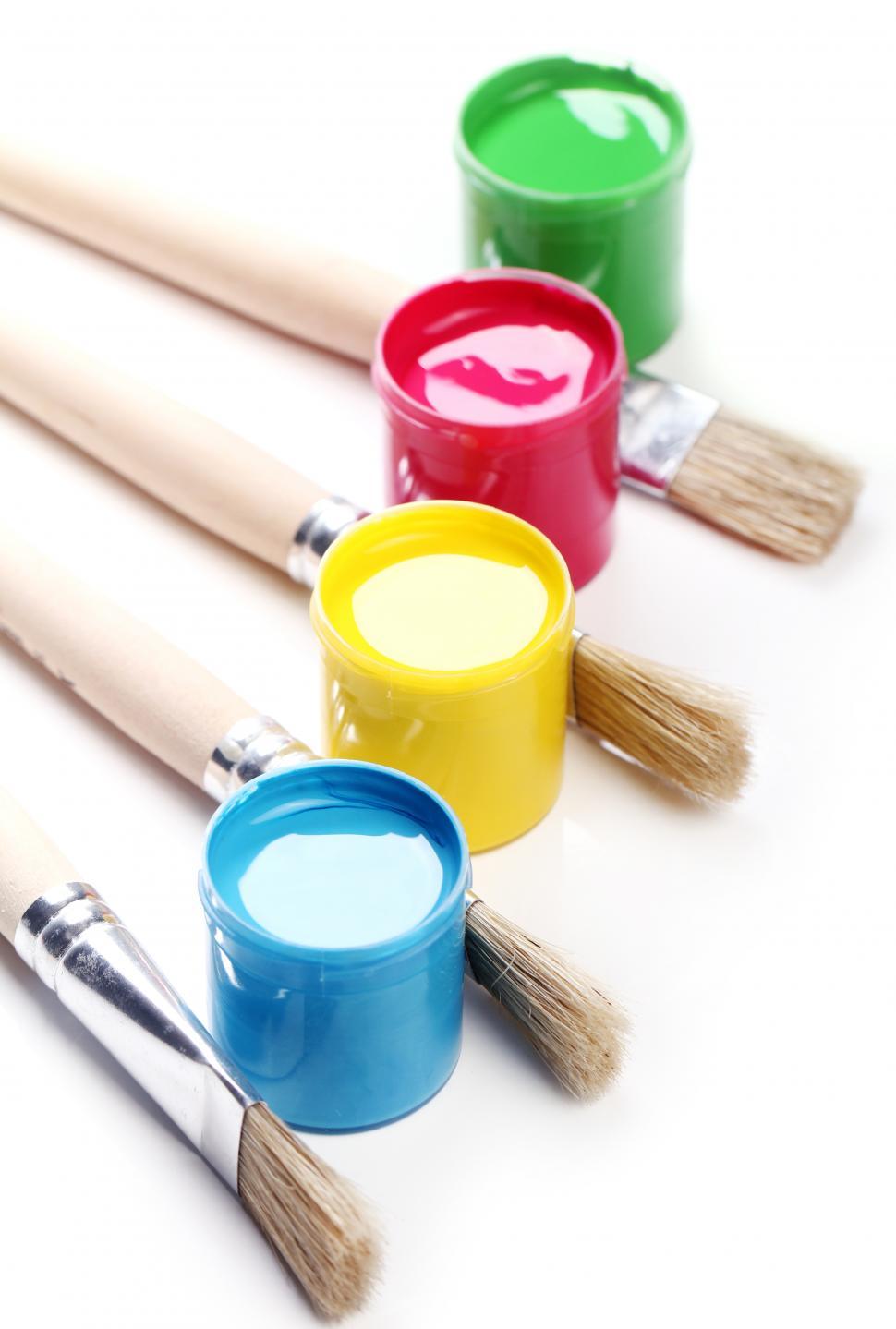 Free Image of Colorful paint and clean brushes 
