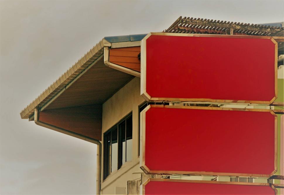 Free Image of Blanked out red building signs  