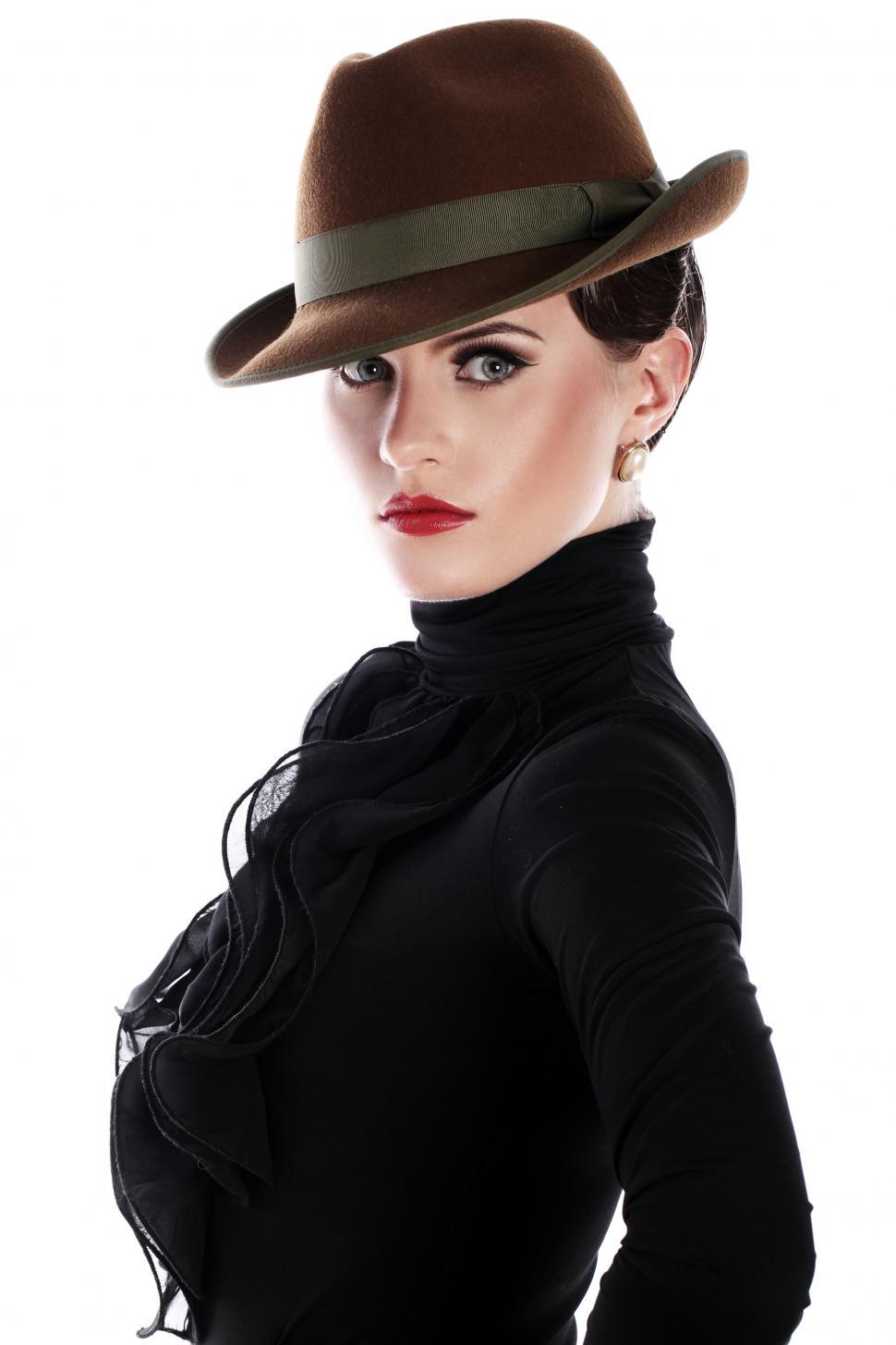 Free Image of Striking young woman in hat 