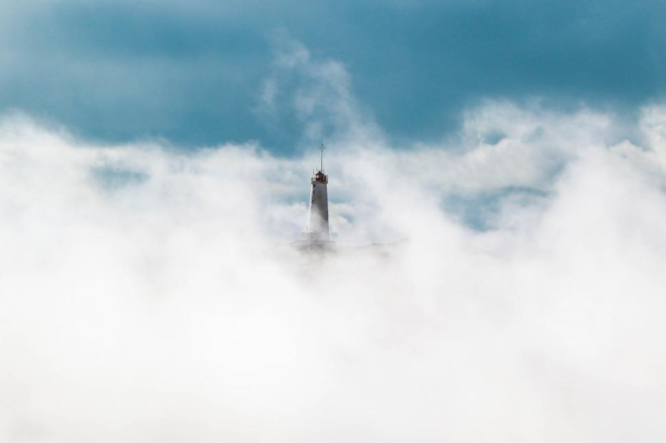 Free Image of Lighthouse tower and clouds 