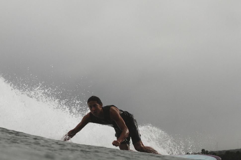 Free Image of Male surfer in ocean 