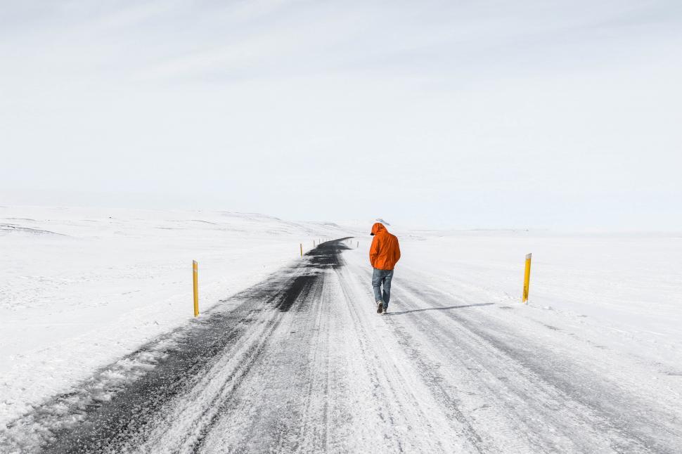 Free Image of Man on snowy road 