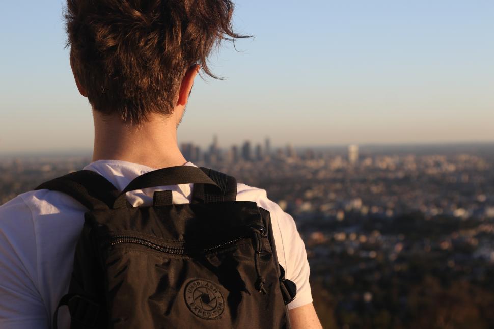 Free Image of Backpacker and city 