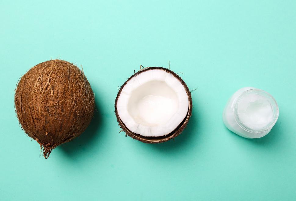 Free Image of Whole Coconut, half coconut, and oil 
