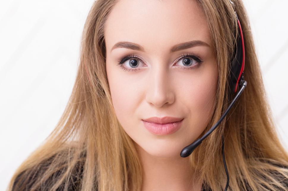 Free Image of Young woman with a headset 