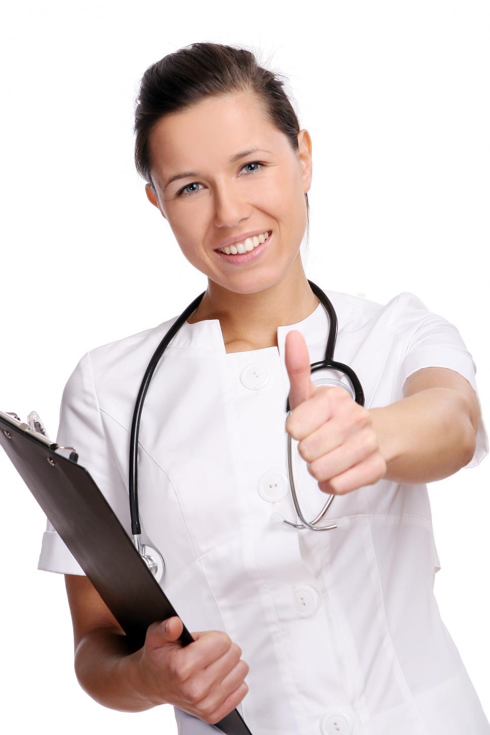 Free Image of Young doctor gives thumbs up 