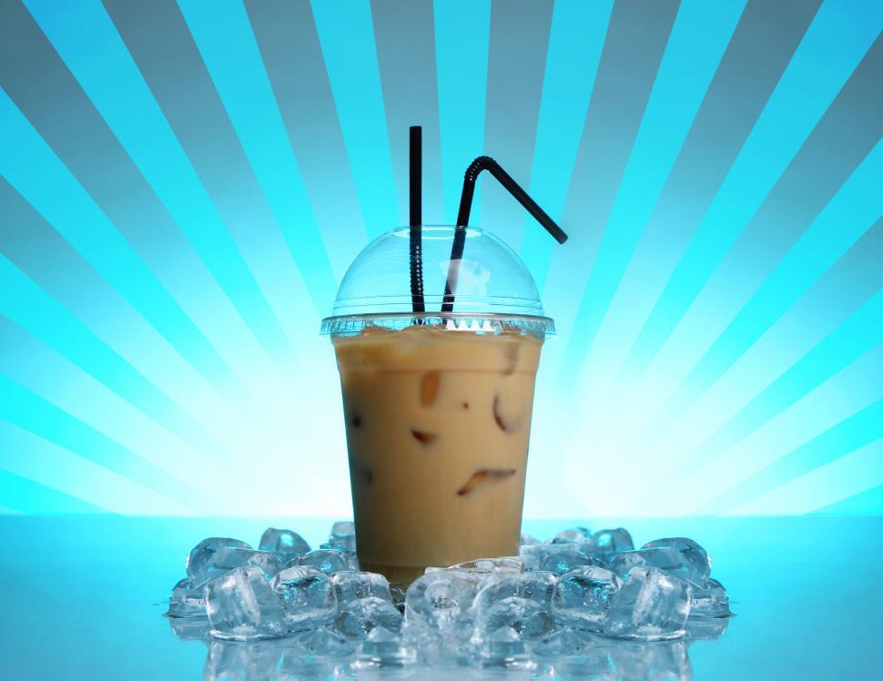 Free Image of Cold coffee drink with graphic background 