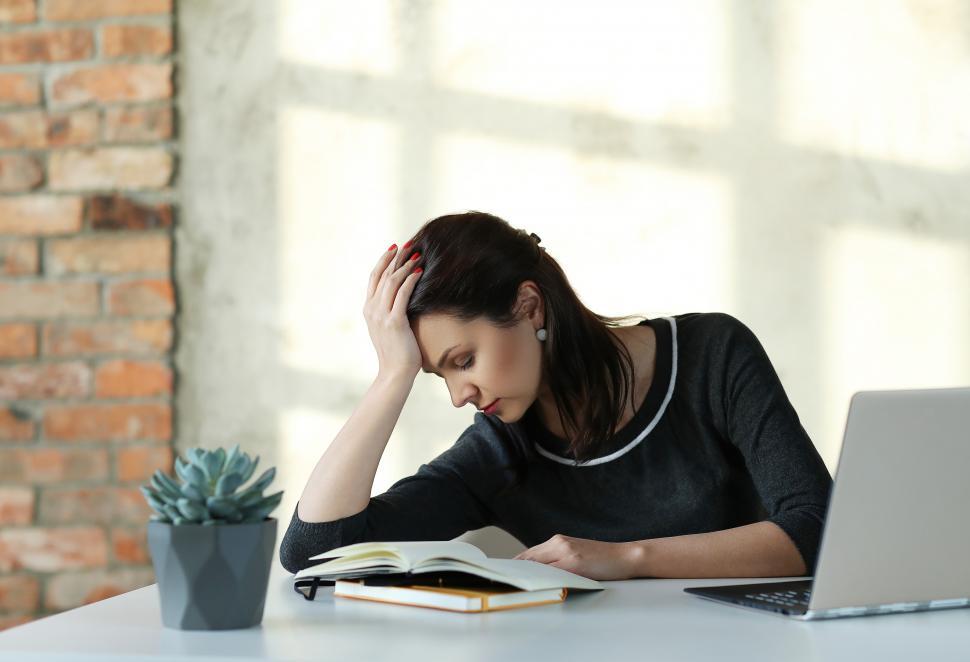 Free Image of Woman frustrated at office 