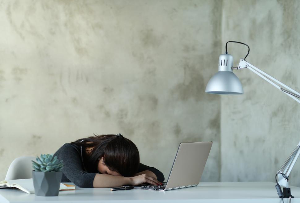Free Image of Exhausted woman in office 