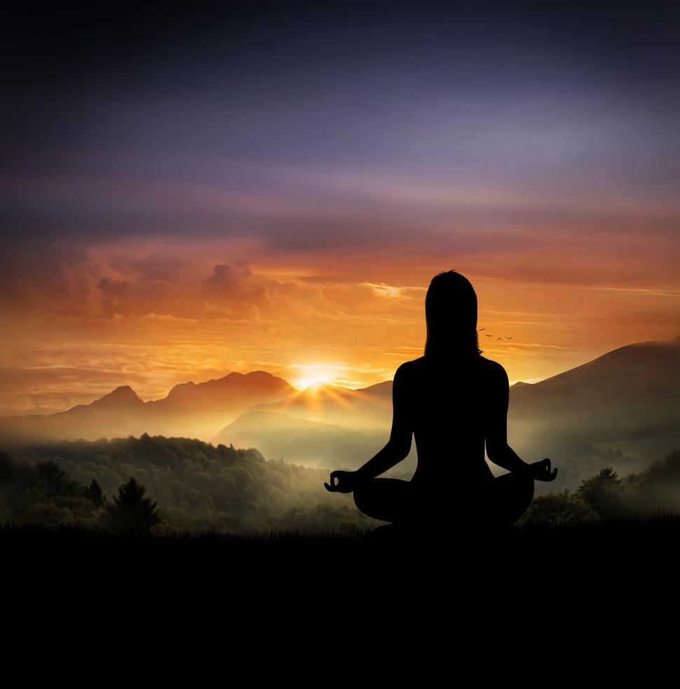 Free Image of Young Woman Doing Yoga At Dusk In the Mountains 