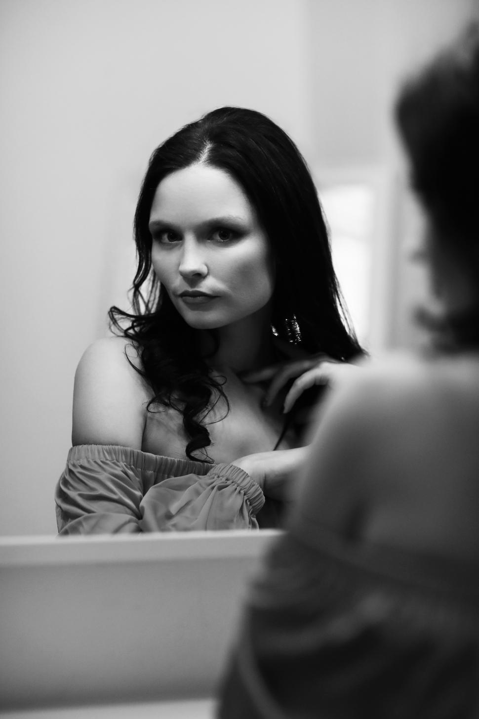 Free Image of Woman and her reflection 