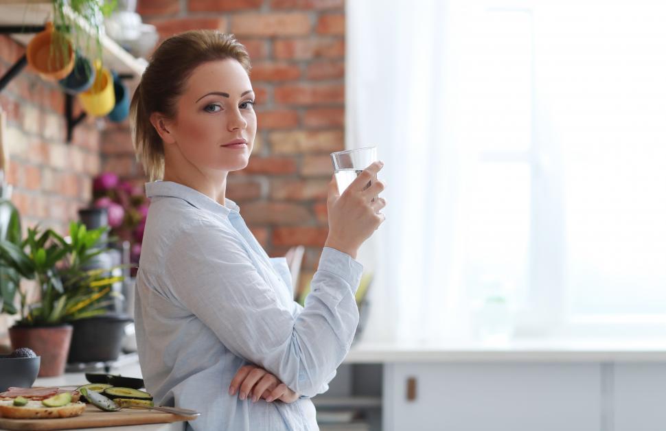 Free Image of Woman with a glass of water 