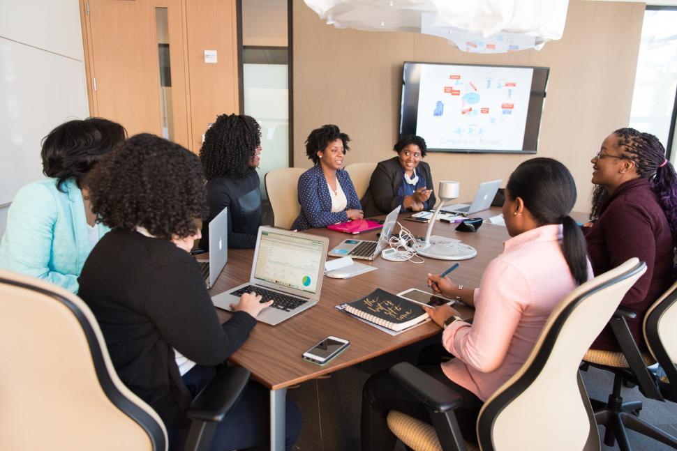 Free Image of Business women working together in meeting room 