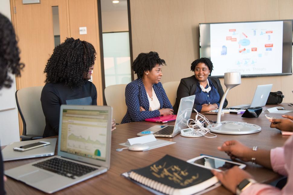 Free Image of Businesswomen working together in meeting room 