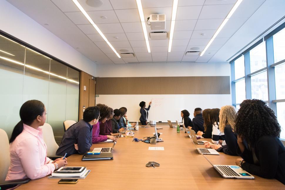 Free Image of Business people attending a presentation in meeting room 