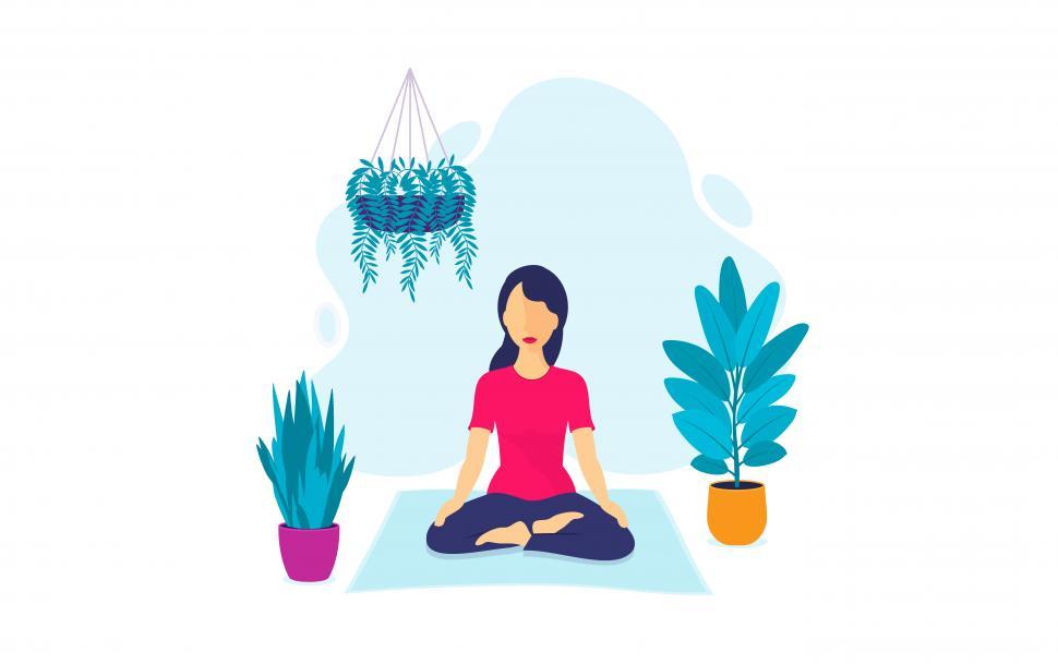 Free Image of Young Woman Meditating Surrounded by Plants 