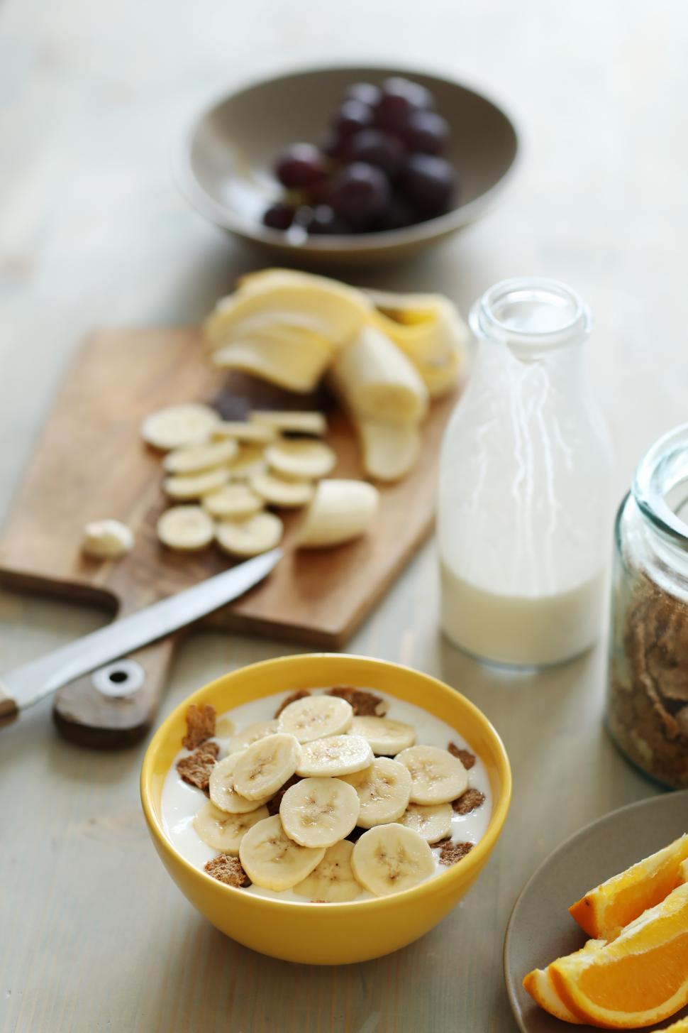 Free Image of Breakfast - Bananas over milk and cereal 