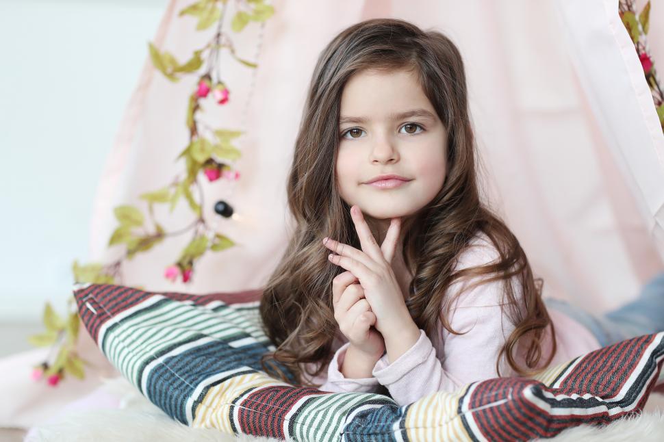Free Image of Young girl looking at the camera 