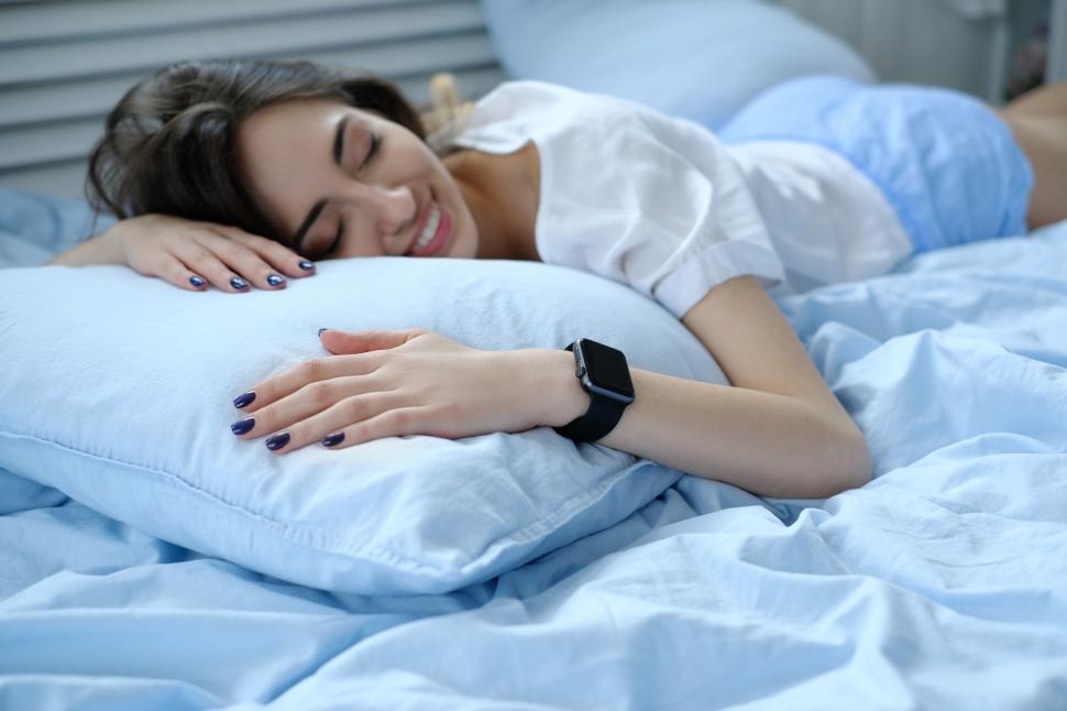 Free Image of Smart watch on sleeping person 