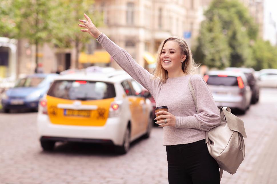Free Image of Woman hailing a cab 