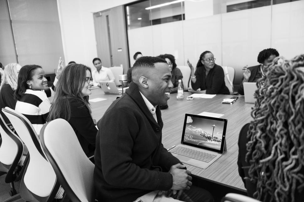 Free Image of Happy Business people in meeting room - b&w 