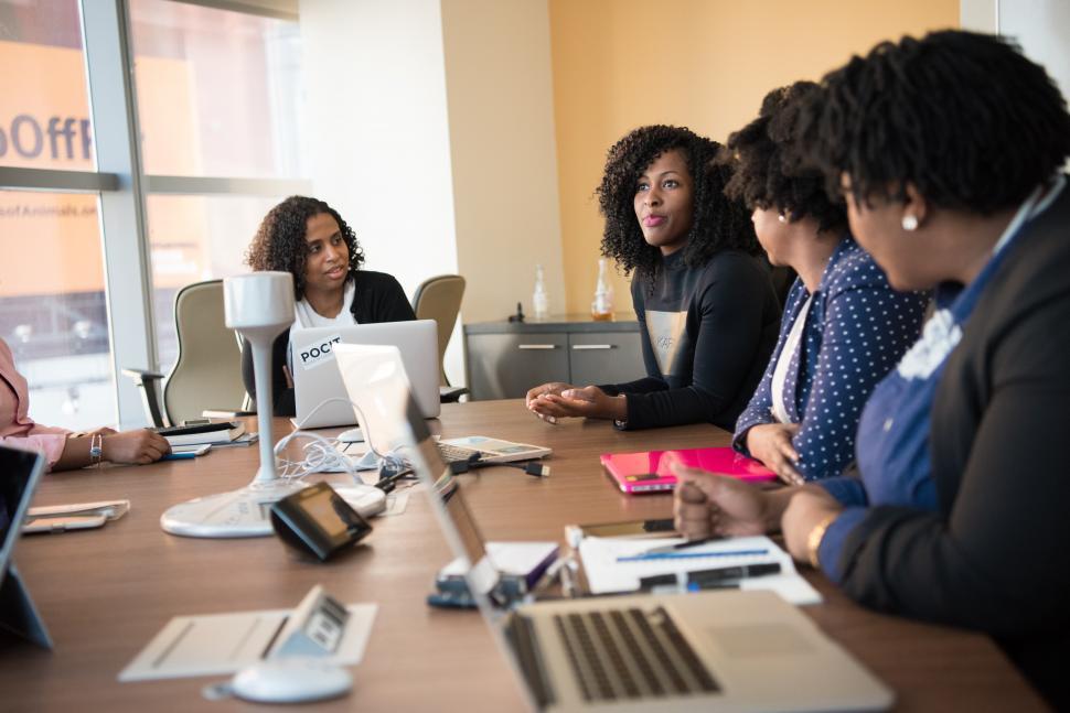 Free Image of Businesswomen working together in meeting room - group discussio 