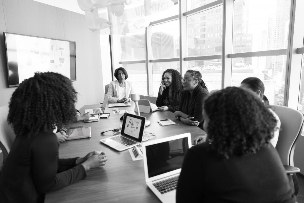 Free Image of Businesswomen working together in meeting room - b&w 