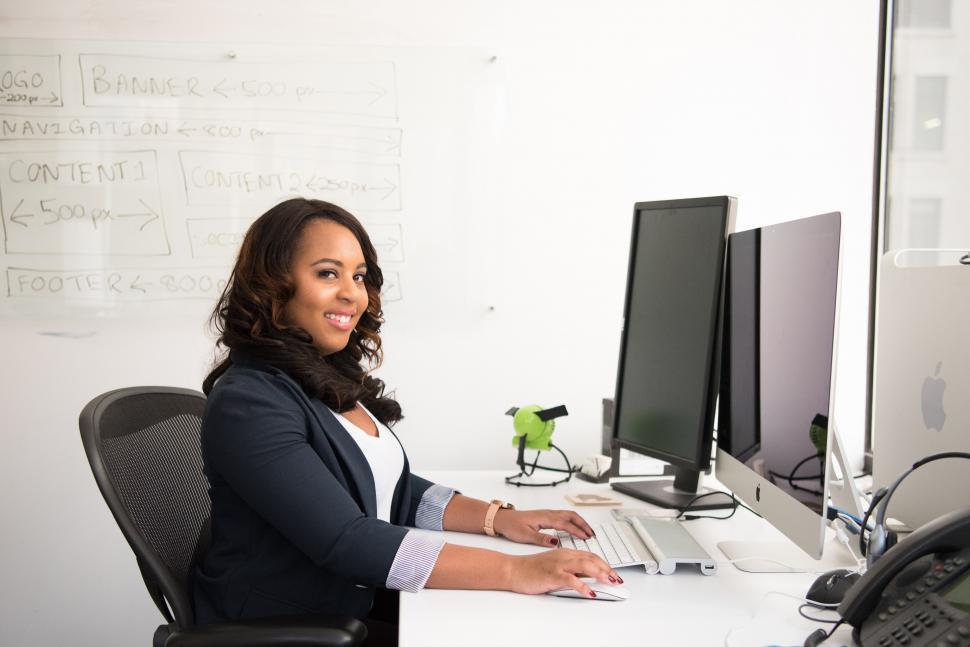 Free Image of Female executive working on computer in office 