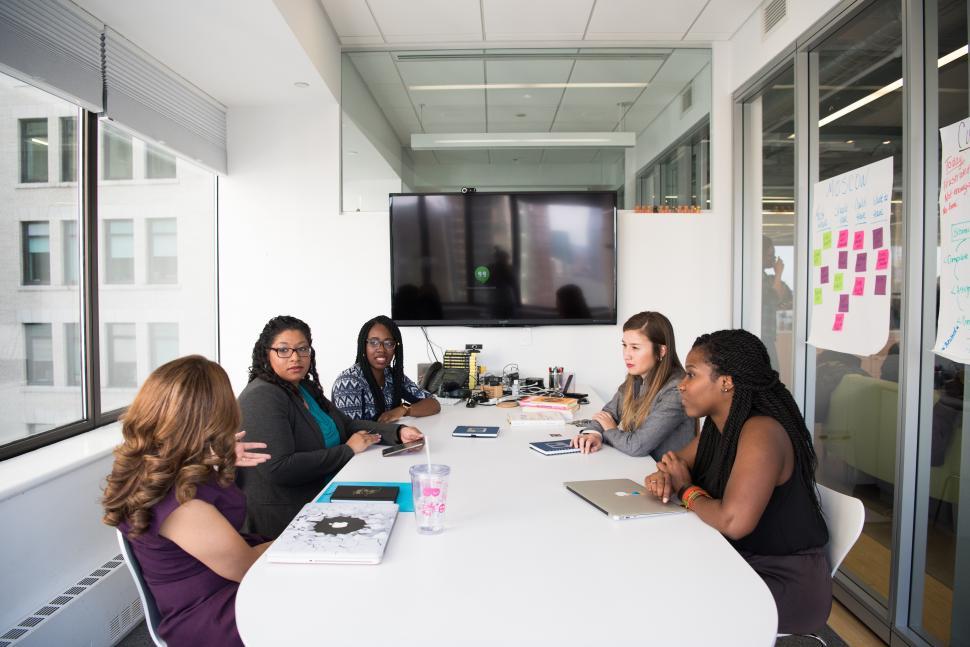 Free Image of Businesswomen discussing a plan in meeting room 
