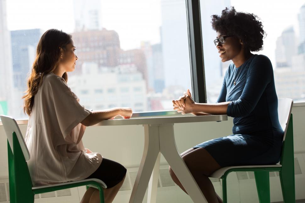 Free Image of Two business women having a conversation 