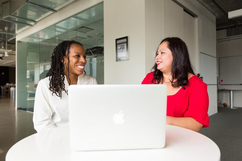 Free Image of Happy business women with laptop 