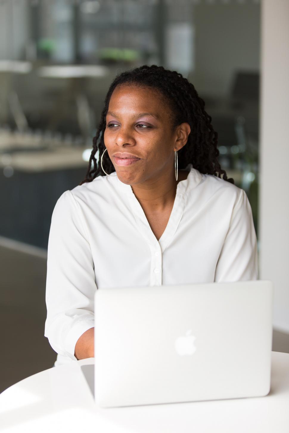 Free Image of Businesswoman with laptop - looking away 