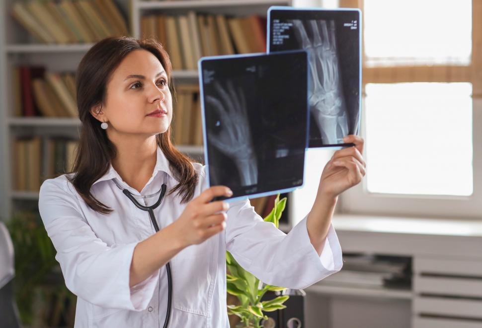 Free Image of Health Care Worker looking at Xray 