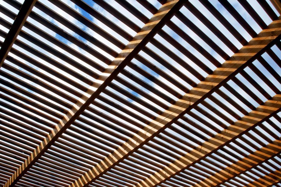 Free Image of Wooden Shade Roof With Sunlight and Shadow - Background 