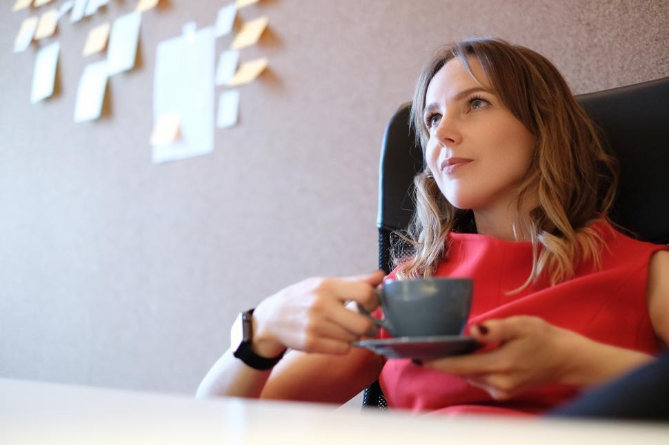 Free Image of Thoughtful Woman in the Workplace 