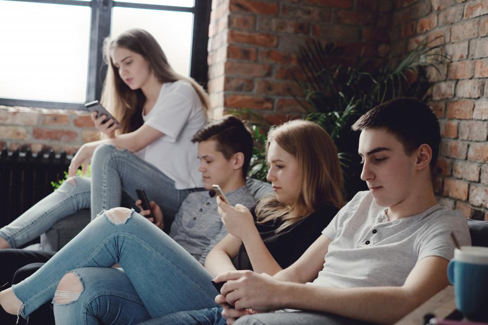 Free Image of Teenagers texting and messaging 